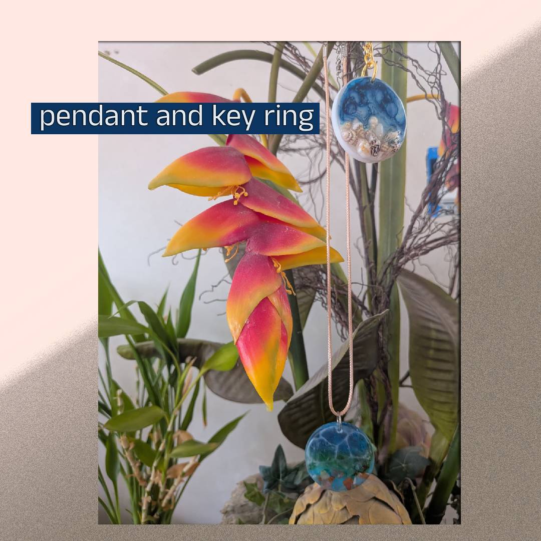 set of pendant, earrings and keychain with a sea theme