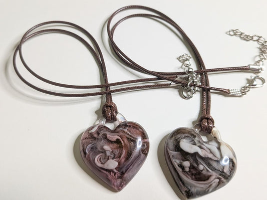 2 heart-shaped epoxy resin pendants