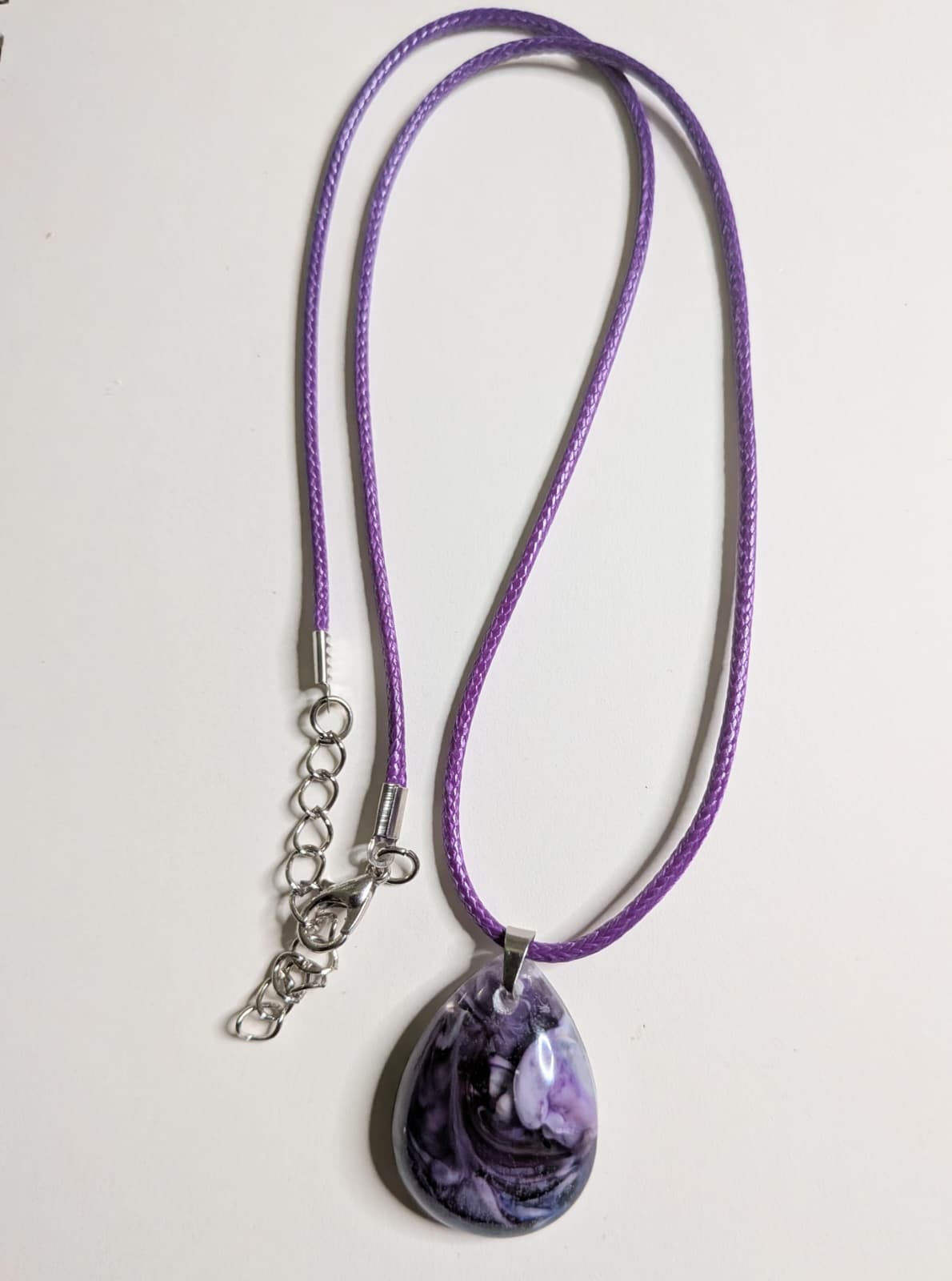 3 resin pendants designed with a petri dish effect