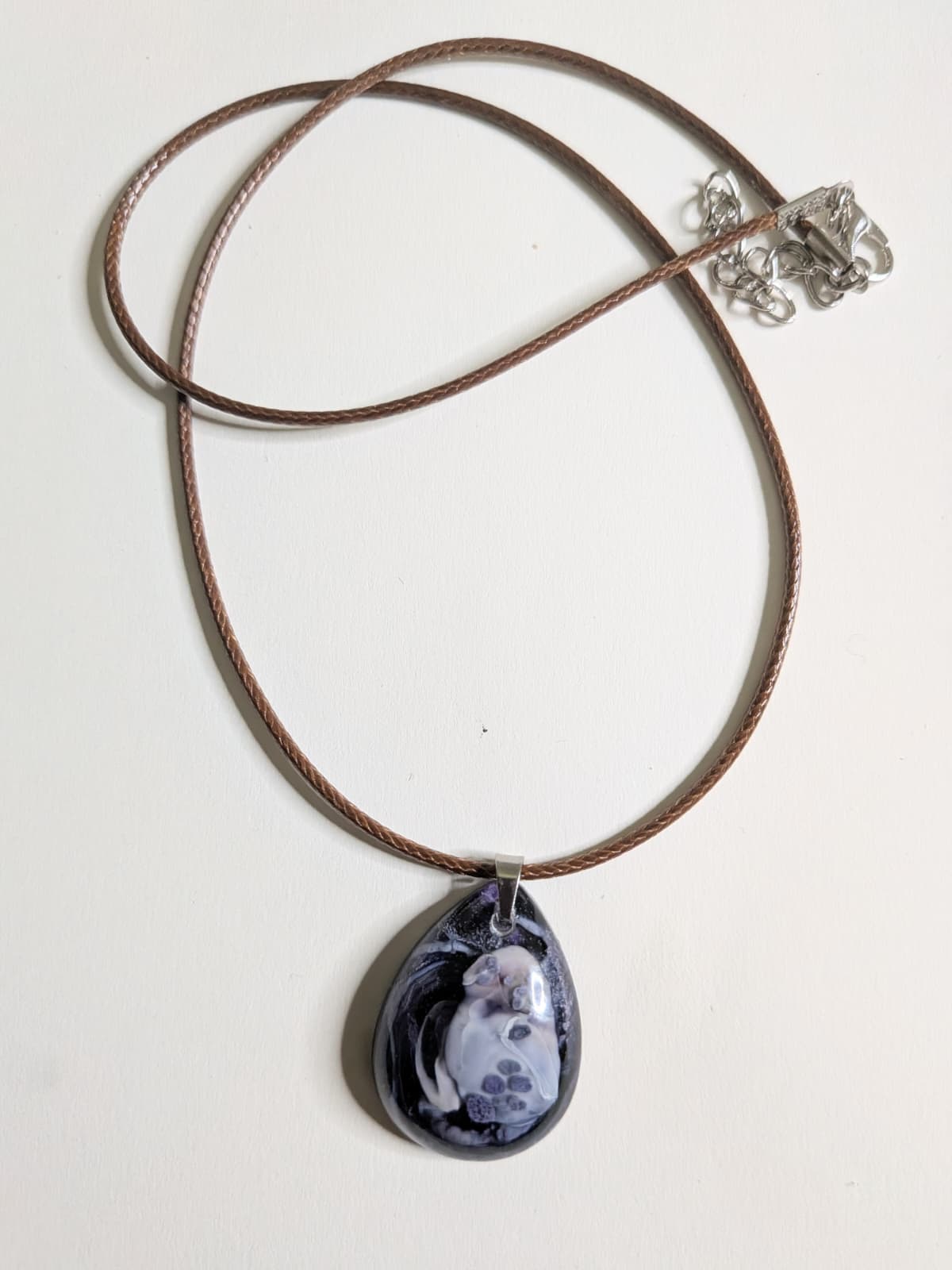 3 resin pendants designed with a petri dish effect