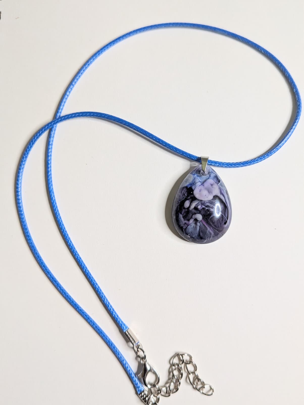 3 resin pendants designed with a petri dish effect