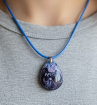 3 resin pendants designed with a petri dish effect